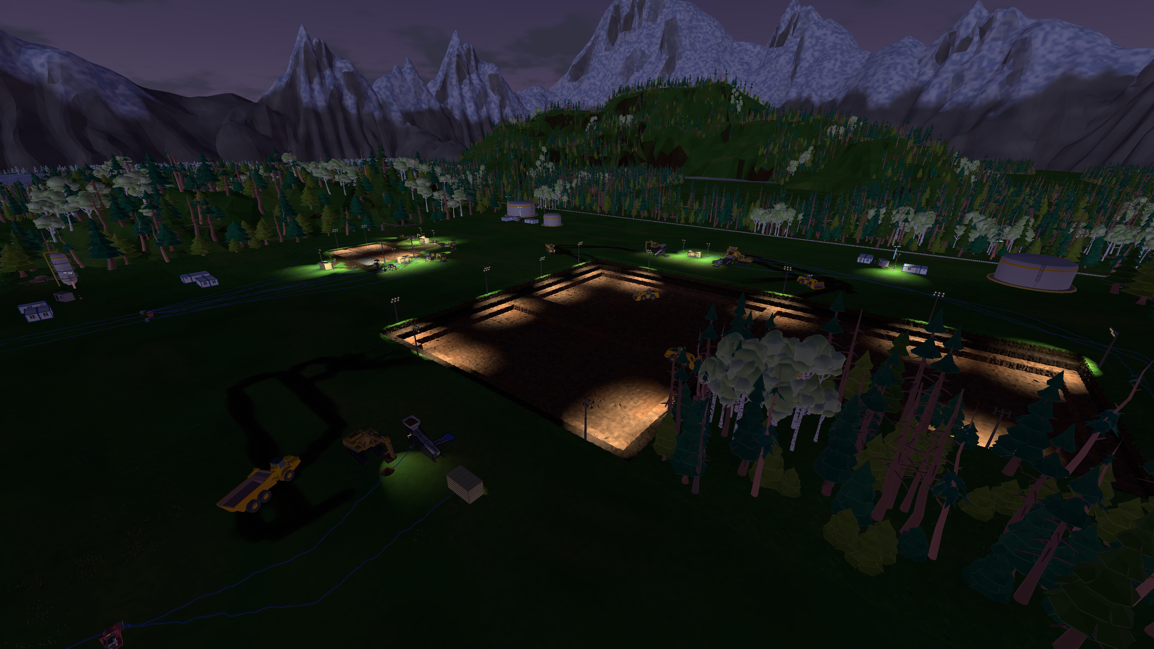 A floodlit dig site at night, mountains behind
